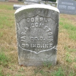 James A. Comstock's gravestone (front)
